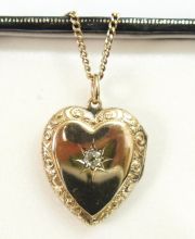 Antikes Medaillon aus 375/000 Gelbgold ca.0,20ct Brillant + Kett